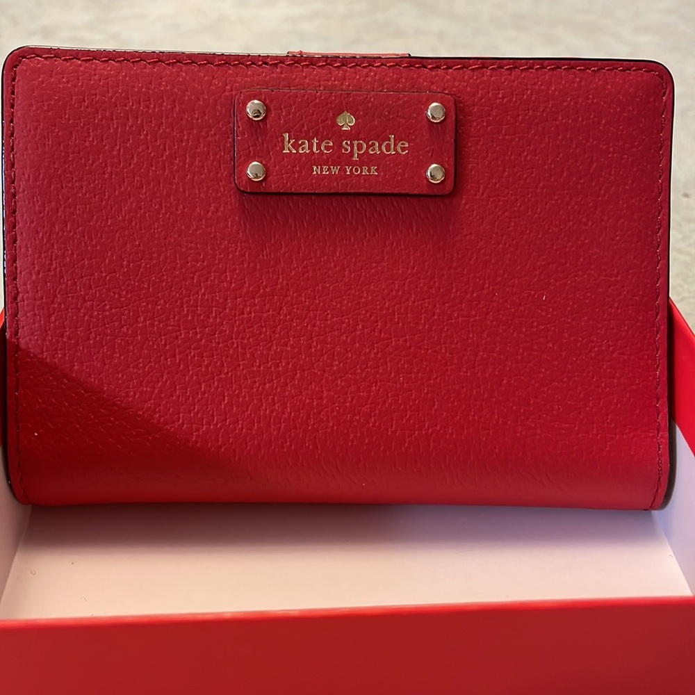 Red Kate Spade Tellie Redcarpet Wallet in box with tags.